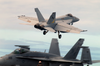 An F/a-18e Super Hornet, Assigned To The Eagles Of Strike Fighter Squadron One One Five (vfa-115), Takes Off From The Flight Deck Of Uss John C. Stennis (cvn 74) Image