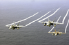 F/a-18a Hornets Fly Over The Western Pacific Ocean During Flight Operations. Image