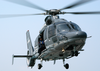 A Hong Kong Government Services Ec 155 Dauphin Helicopter Hovers Over The Flight Deck Of Uss Blue Ridge (lcc 19) During Joint Training With The Seventh Fleet Flag Ship In Hong Kong Harbor. Image