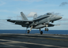 An F/a-18c Hornet Lands On The Flight Deck Image