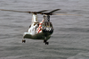 A Ch-46 Sea Knight Helicopter Conducts A Replenishment At Sea (ras) With Uss Kitty Hawk (cv 63). Image