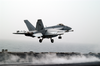 An F/a-18e Super Hornet Launches From One Of Four Steam Powered Catapults On The Flight Deck Of Uss Abraham Lincoln (cvn 72). Image