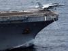 A F/a-18f Super Hornet Launches From The Bow Of Uss John C. Stennis (cvn 74). Image