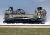 A Landing Craft Air Cushion (lcac) Comes Ashore At U.s. Naval Forces Marianas Island Image