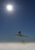 A C-9b Skytrain Ii From The Conquistadors Of Fleet Logistics Squadron Fifty Seven (vr-57) Climbs Above The Clouds Image