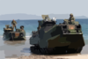 Amphibious Assault Vehicles (aav) Arrive On The Philippine Shore From The Amphibious Transport Dock Ship Uss Fort Mchenry (lsd 43) Clip Art