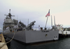 A Lone Sailor Stands Watch On The Fantail Of The Uss Chancellorsville (cg 62) As The Guided Missile Cruiser Prepares To Get Underway From Apra Harbor, Guam. Image