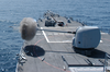 The Guided Missile Destroyer Uss John Paul Jones (ddg 53) Fires A Five-inch Round From A Mk-45 5-inch Gun (5 Inch 54 Cal.) During A Live-fire Exercise. Image