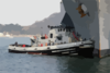 A Large Harbor Tug Uss Opelika (ytb 798) Assists Amphibious Command And Control Ship Uss Blue Ridge (lcc 19) To Its Berth After A Scheduled Deployment In The Western Pacific Clip Art