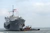 Tugboats Assist The Amphibious Command And Control Ship Uss Mount Whitney (lcc/jcc 20) To The Pier. Image