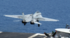 An F-14d Tomcat Launches From The Flight Deck Aboard Uss Theodore Roosevelt (cvn 71) Image