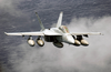 An F/a-18f Super Hornet Flies Over The Western Pacific Ocean During Flight Operations. Image