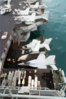 An S-3b  Viking  Aircraft And An F/a-18e  Super Hornet  Are Lowered From The Flight Deck To The Hangar Bay Clip Art